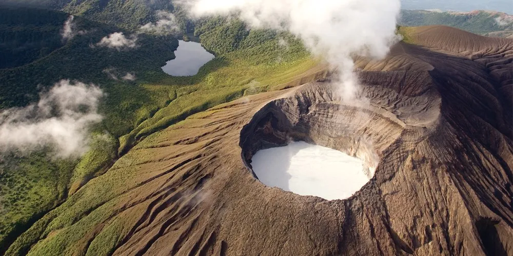 a mountain with smoke coming out of it
