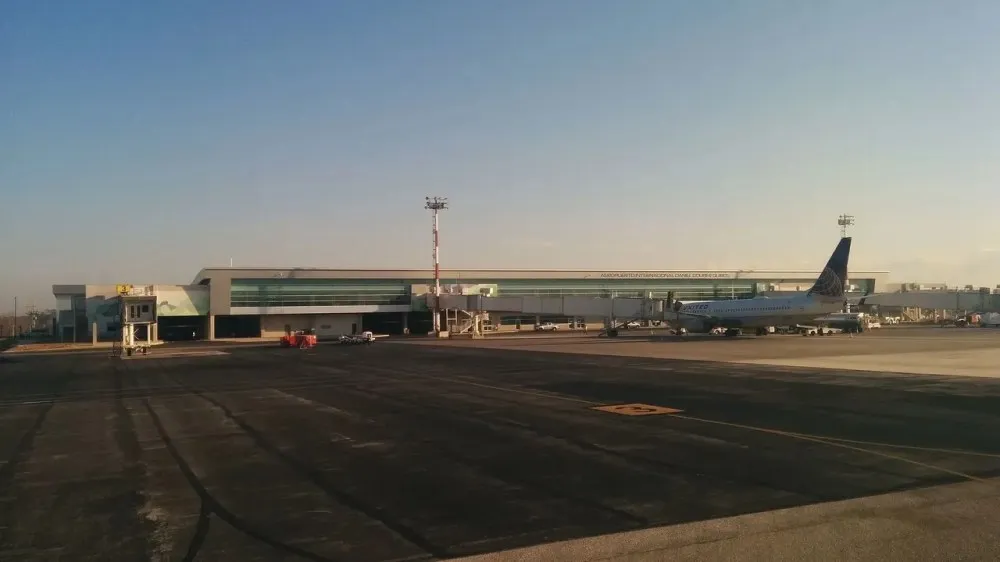 a airplane that is parked on the side of a road