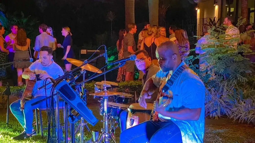 a group of people sitting on a stage