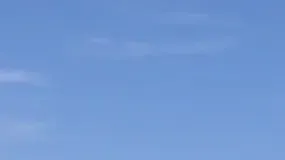 a person flying through the sky